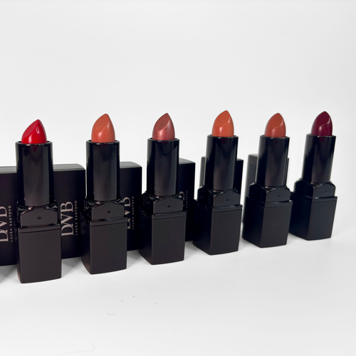 Set of DNB lipsticks in various shades on a white background
