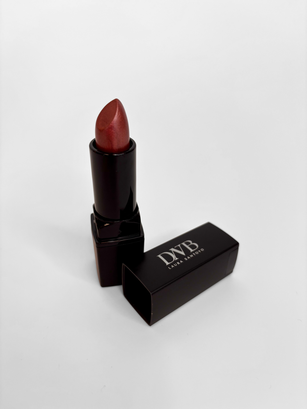 Lipstick with black case on a white background