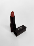 Lipstick with black case on a white background